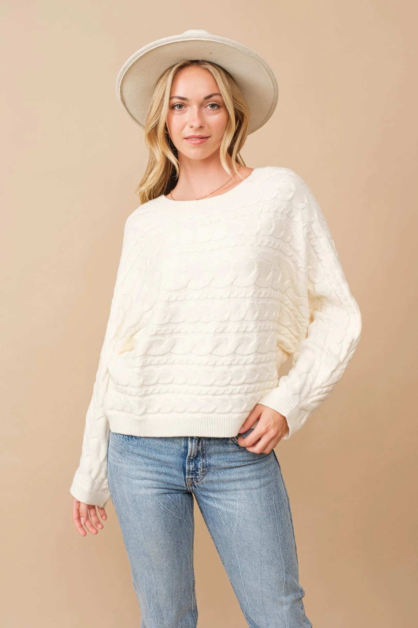 Horizontal cable knit dolman sleeve sweater